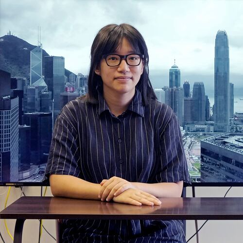 FILE - Chow Hang-tung, vice chairperson of the Hong Kong Alliance in Support of the Democratic Patriotic Movements of China, poses after an interview in Hong Kong on May 24, 2021. (AP Photo/Vincent Yu, File)