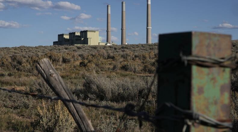 FILE - Craig Station, a coal-fired power plant, operates Oct. 8, 2025, in Craig, Colo. (AP Photo/Brittany Peterson, File)