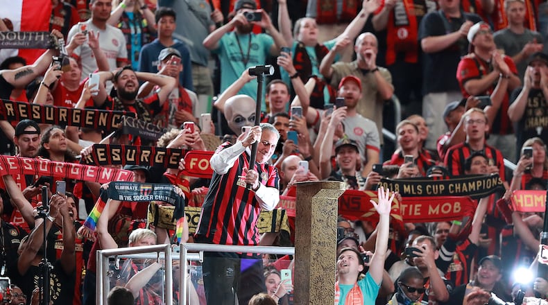 May 12, 2019 Atlanta: The fans cheer Atlanta United owner Arthur Blank as he hammers the golden spike to begin the game against Orlando City in a MLS soccer match on Sunday, May 12, 2019, in Atlanta. Blank also owns the Atlanta Falcons. Curtis Compton/ccompton@ajc.com