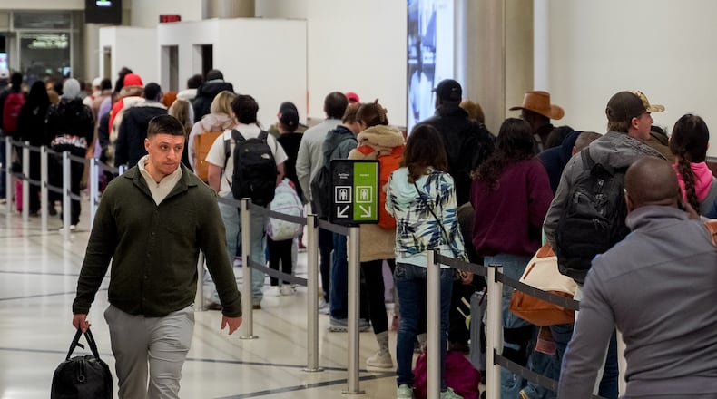 Post holiday travelers descend on Atlanta's Hartsfield-Jackson International Airport on Friday, December 27, 2024 (Ben Hendren for the Atlanta Journal-Constitution)