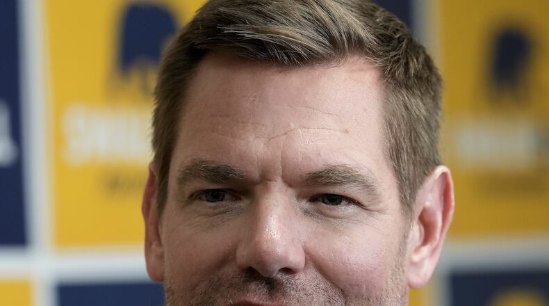 California gubernatorial candidate Rep. Eric Swalwell, D-Calif., talks with reporters after holding a town hall meeting in Sacramento, Calif., Tuesday, April 7, 2026. (AP Photo/Rich Pedroncelli)