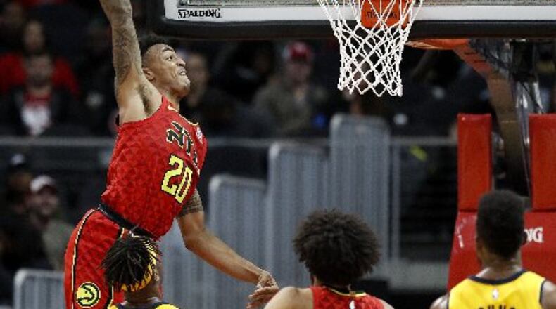 John Collins is rising up in the rookie rankings. (AP Photo)