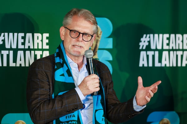 Christian Fischer, president and CEO of Georgia-Pacific, addresses the crowd during a news conference as the Atlanta World Cup Host Committee marks one year to go until the World Cup. (Jason Getz / AJC)