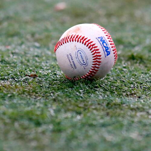 FILE - The NCAA logo is seen on a baseball during an NCAA college baseball tournament regional game between Louisiana-Lafayette and Mississippi State in Lafayette, La., June 2, 2014. (AP Photo/Jonathan Bachman, File)