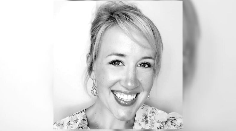 Sarah Bolt was struck and killed by a car Saturday while helping a driver involved in a separate crash on I-75 South in Marietta, police said.