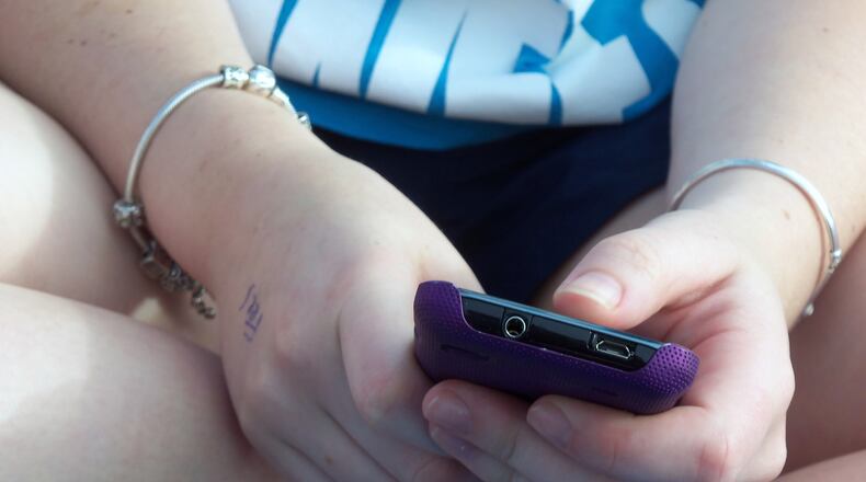 Hidden phone apps that allow teens to talk anonymously online could put them at risk, police say.