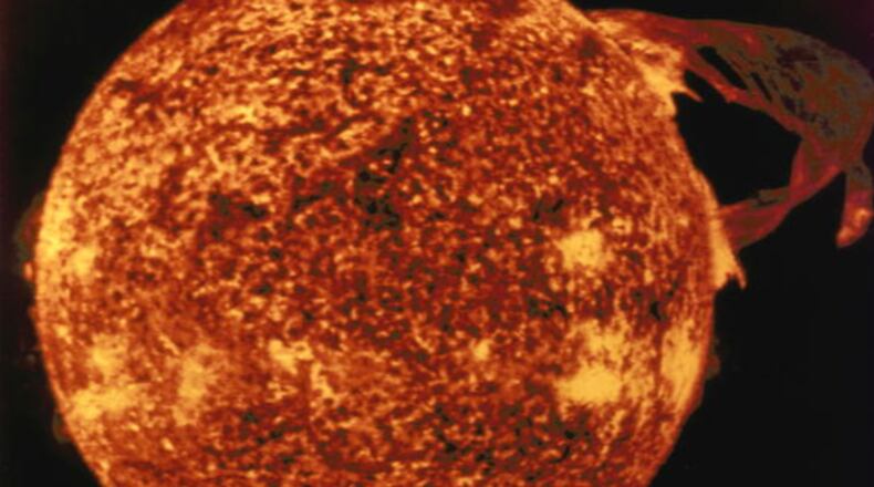 This photo taken from the Skylab space station on December 19, 1973, shows one of the most spectacular solar flares ever recorded. Solar flares are sudden outbursts of energy originating on the sun’s surface and projecting far into its atmosphere. NASA’s newest solar mission, called the Parker Solar mission, launches next summer and will study solar winds, magnetic fields, energized particles and plasma.