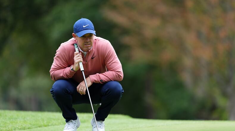 Rory McIlroy of Northern Ireland on the 16th green on day three of the PGA Championship at Wentworth Golf Club in Virginia Water, England, Saturday Sept. 19, 2026. (Adam Davy/PA via AP)