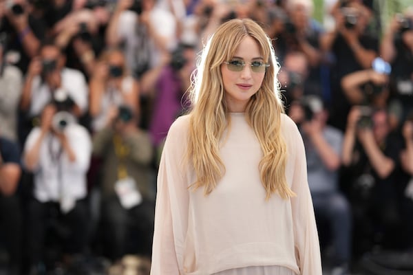 Jennifer Lawrence poses for photographers at the photo call for the film 'Die, My Love' at the 78th international film festival, Cannes, southern France, Sunday, May 18, 2025. (Photo by Scott A Garfitt/Invision/AP)