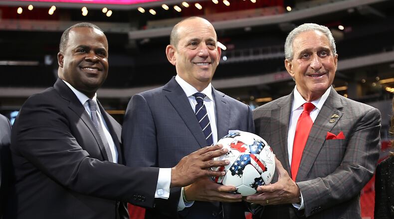 October 23, 2017. MLS Commissioner Don Garber, Atlanta United Owner Arthur Blank, Atlanta Mayor Kasim Reed, pose for a photo after the press conference where Mercedes-Benz Stadium on Monday was named as host of the MLS All Star game on 2018.