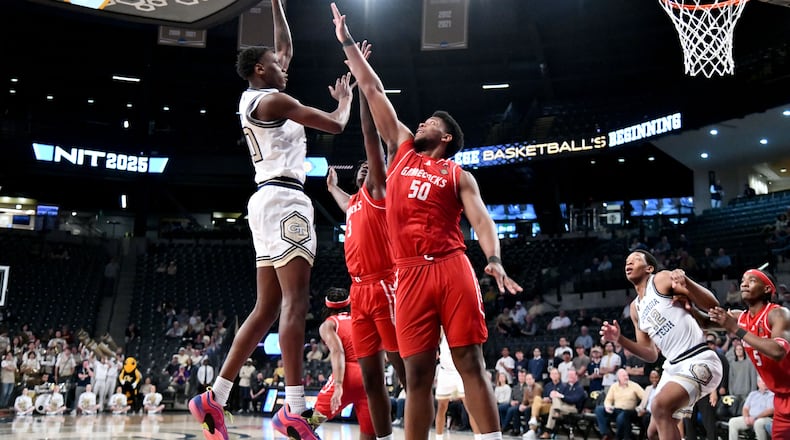 Georgia Tech forward Darrion Sutton (10) shoots over Jacksonville State guard Koree Cotton (3) and center Mason Nicholson (50) last month. Sutton has entered the transfer portal, intending to play somewhere else next year. (Hyosub Shin / AJC)