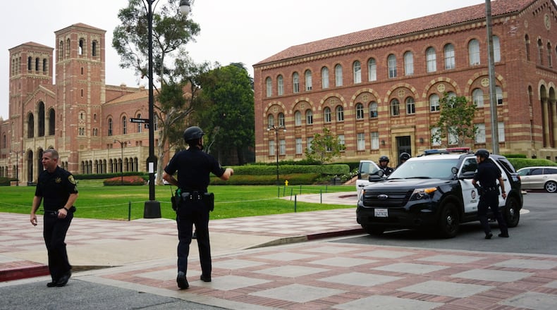 Police work at the scene of a shooting at the University of California, Los Angeles, Wednesday, June 1, 2016, in Los Angeles.(AP Photo/Christine Armario)