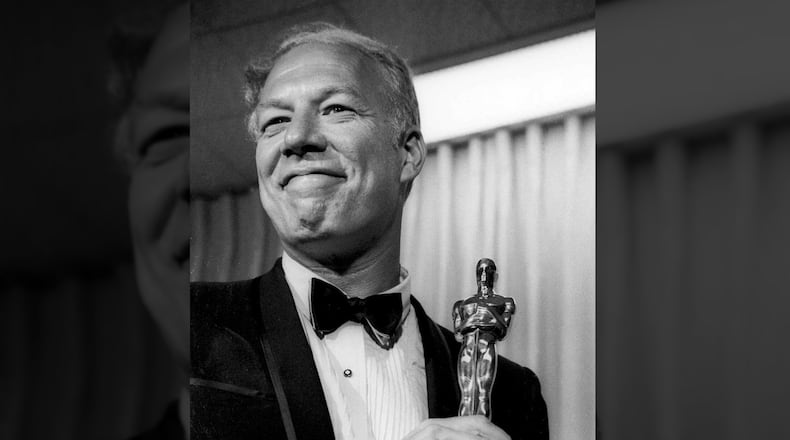 In this April 10, 1968, file photo, George Kennedy poses with his Oscar in Santa Monica, Calif, after winning best supporting actor for "Cool Hand Luke." Kennedy died, Sunday, Feb. 28, 2016, of natural causes in Boise, Idaho, where he moved with his late wife in 2002. He was 91. (AP Photo, File)