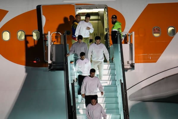 Venezuelan migrants deported from the United States arrive at Simon Bolivar International Airport in Maiquetia, Venezuela, Monday, March 24, 2025. (AP Photo/Ariana Cubillos)
