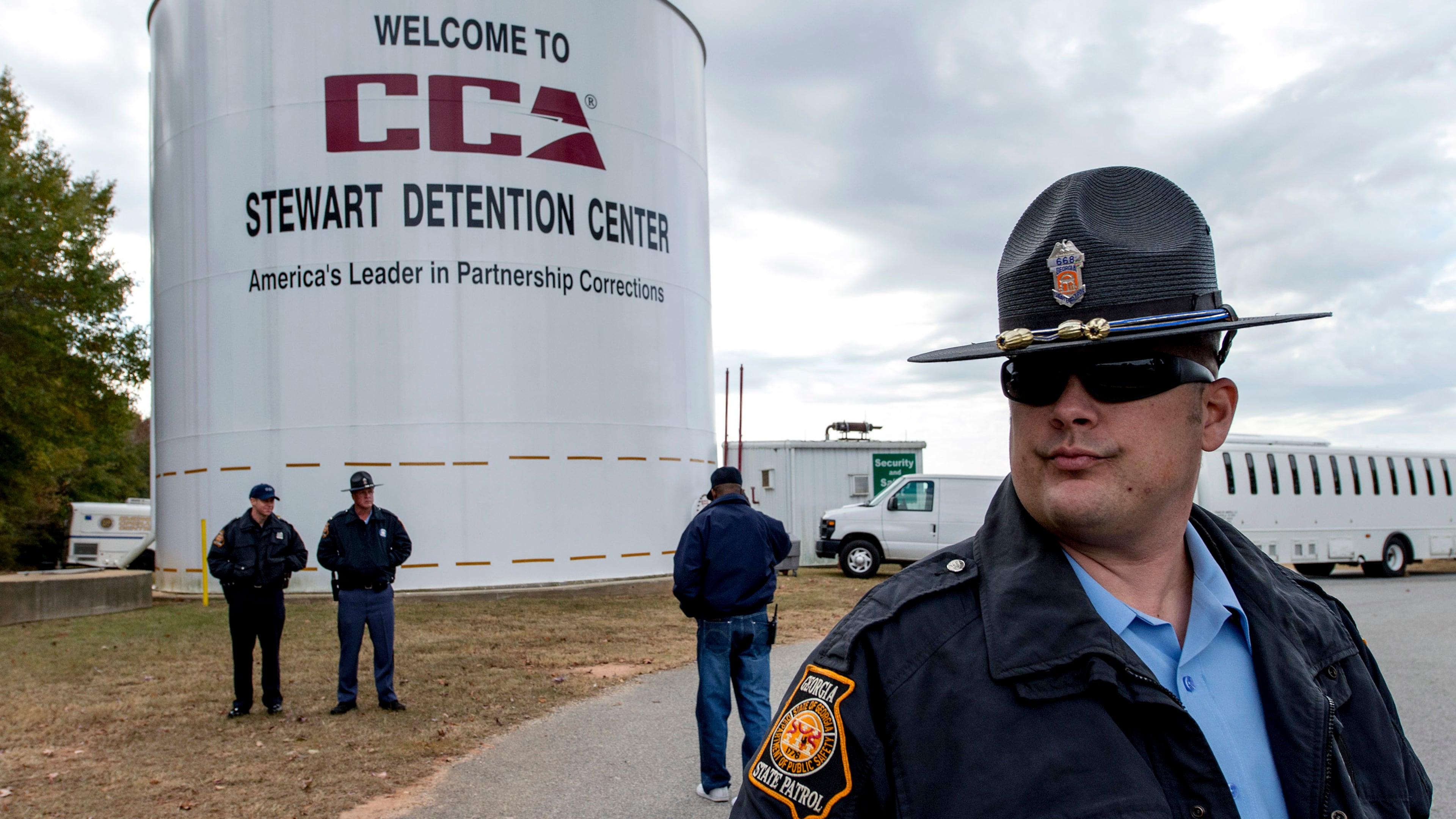 Security personnel in 2014 at the Stewart Detention Center, the largest Immigration and Customs Enforcement (ICE) facility in the country. Operated by the for-profit Corrections Corporation of America, the 1,752-bed, medium-security prison houses men awaiting trial on immigration matters. (Brian Cahn/Zuma Press Wire/TNS)