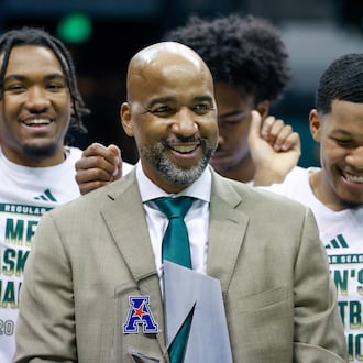 In his first season as USF men's basketball coach, Amir Abdur-Rahim led the Bulls to a 25-8 record and the American Athletic Conference regular-season title. (Jefferee Woo/Tampa Bay Times 2024)