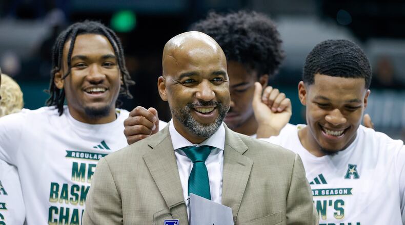 In his first season as USF men's basketball coach, Amir Abdur-Rahim led the Bulls to a 25-8 record and the American Athletic Conference regular-season title. (Jefferee Woo/Tampa Bay Times 2024)