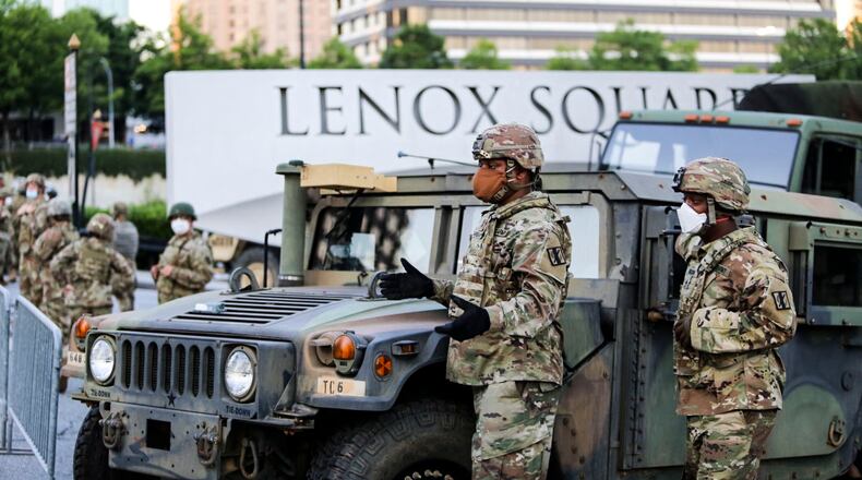 Three guardsmen were injured during a crash on I-75 in Atlanta on Tuesday afternoon.