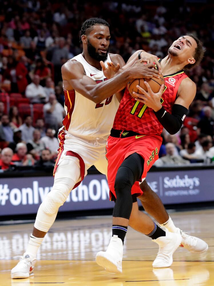 Photos: Hawks star Trae Young injures ankle