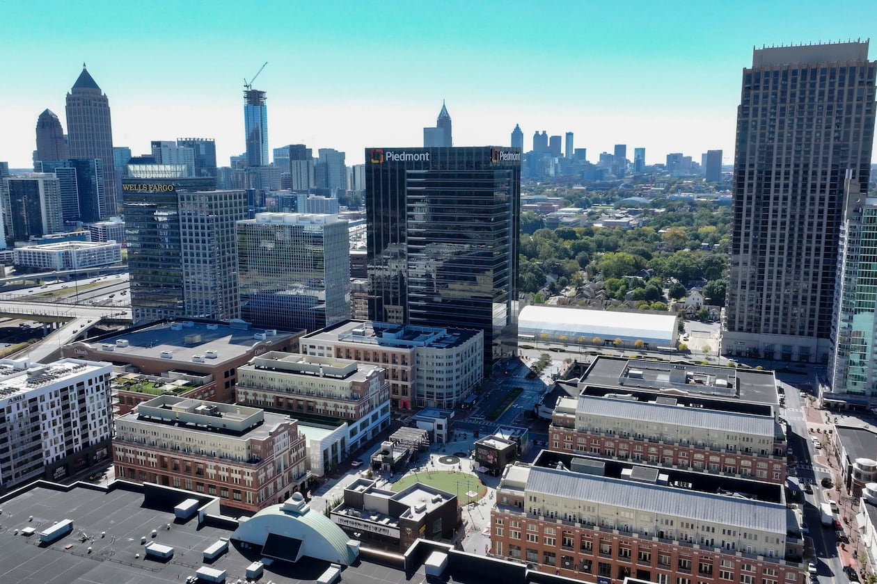 An aerial image shows the main square at Atlantic Station with the Atlanta skyline in the background on Thursday, Oct. 16, 2025.
(Miguel Martinez/AJC)