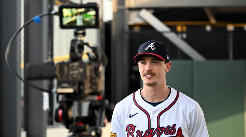 Braves starter Max Fried is interviewed in front of video camera during the team's photo day Feb. 23 in North Port, Florida. (Hyosub Shin / Hyosub.Shin@ajc.com)