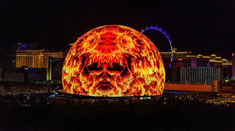 A flaming face graphic appears on the Sphere during the opening night of U2's residency on Friday, Sept. 29, 2023, in Las Vegas. (L.E. Baskow/Las Vegas Review-Journal/TNS)