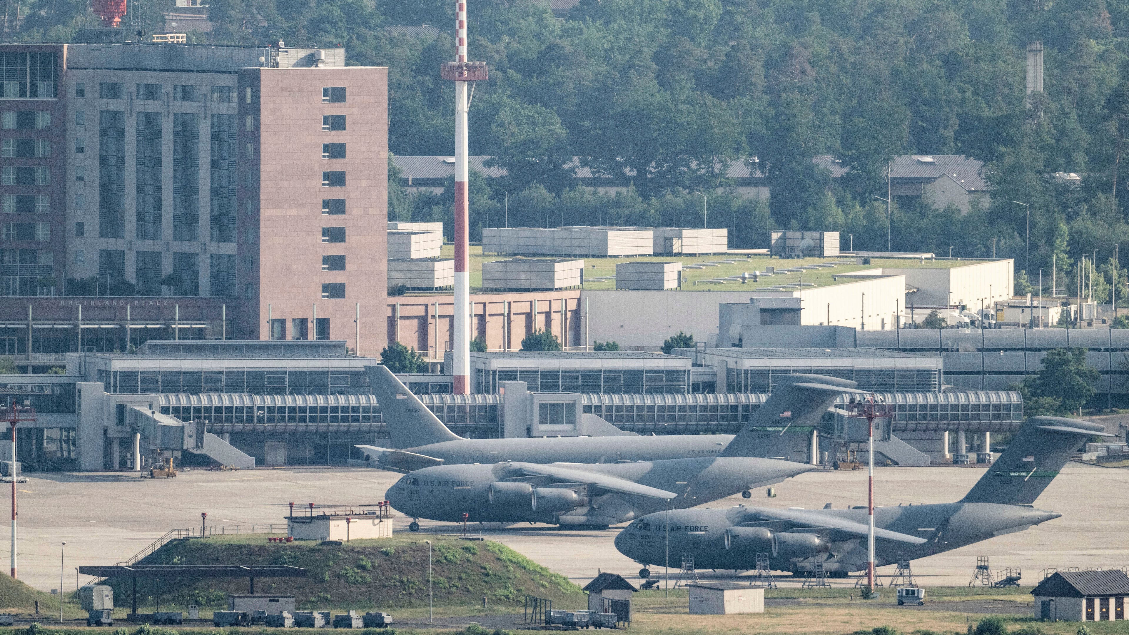 FILE -United States' Air Force transport aircrafts are seen on the tarmac at Ramstein US air base, in Landstuhl, Germany, June 23, 2025. (Boris Roessler/dpa via AP, File)