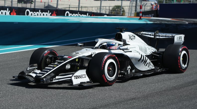 Cadillac driver Sergio Perez of Mexico steers his car during a qualifying session for the Miami Formula One Grand Prix auto race, Saturday, May 2, 2026, in Miami Gardens, Fla. (AP Photo/Lynne Sladky)