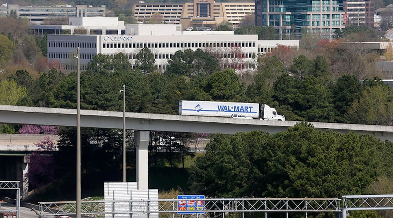 The business district that lured the Braves to Cobb County is looking at ways to link the new stadium site with amenities and parking solutions across the area near I-75 and I-285.