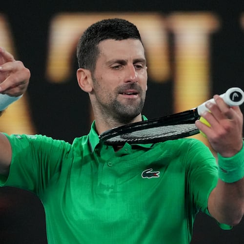 Novak Djokovic of Serbia reacts after defeating Botic van de Zandschulp of the Netherlands in their third round match at the Australian Open tennis championship in Melbourne, Australia, Saturday, Jan. 24, 2026. (AP Photo/Dita Alangkara)