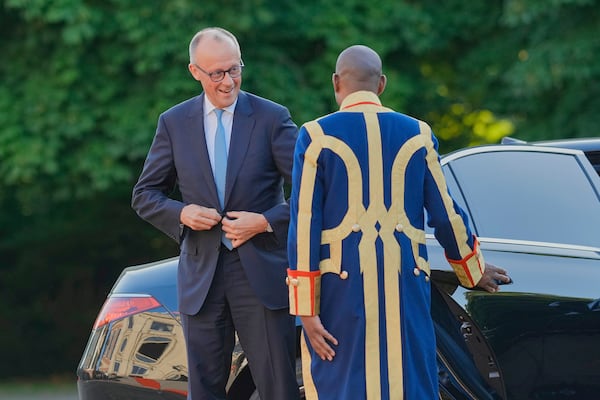 Germany's Chancellor Friedrich Merz arrives for a formal dinner at the Paleis Huis ten Bosch ahead of the NATO summit in The Hague, Netherlands, Tuesday, June 24, 2025. (AP Photo/Markus Schreiber)