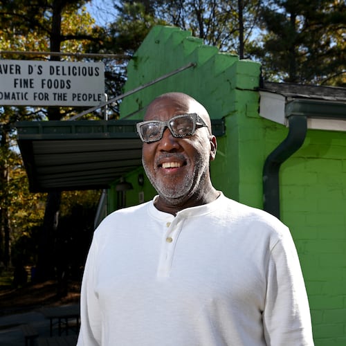 Dexter Weaver, owner of Weaver D’s Delicious Fine Foods, stands outside his restaurant on Wednesday, Nov. 12, 2025. Weaver has put the iconic Athens eatery up for sale, 39 years after he opened it. (Hyosub Shin/AJC)