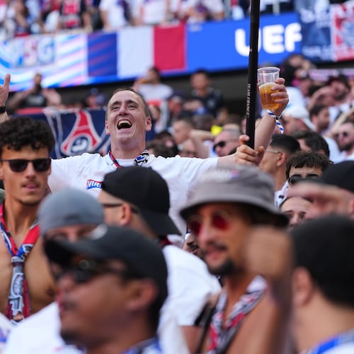 FILE - PSG fans cheer for their team before the Champions League final soccer match between Paris Saint-Germain and Arsenal in Budapest, Hungary, May 30, 2026. (AP Photo/Andreea Alexandru, File)