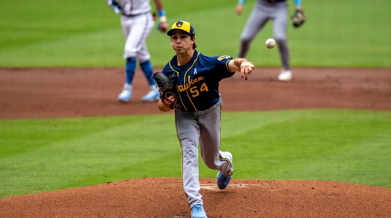 Milwaukee Brewers pitcher Robert Gasser (54) throws during the first inning of a baseball game against the Atlanta Braves, Sunday, June 21, 2026, in Atlanta. (AP Photo/Erik Rank)
