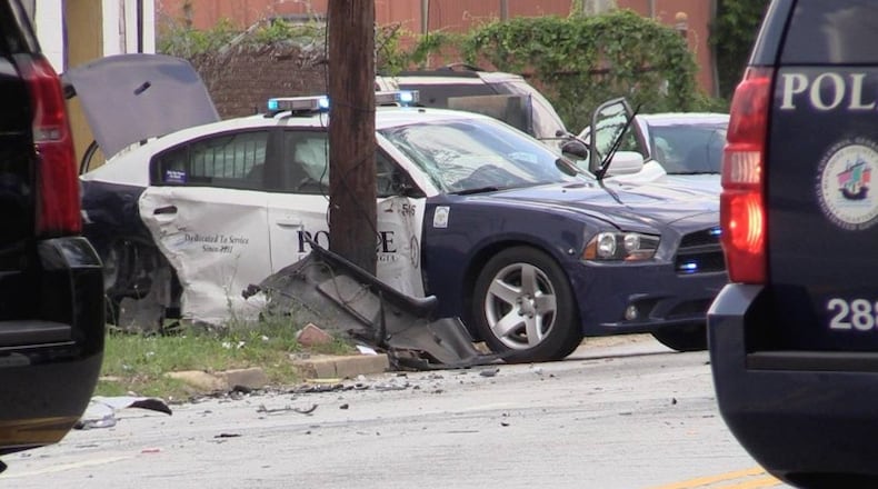 A Columbus police car was damaged in a chase after which a murder suspect died. (Credit: Columbus Ledger-Enquirer)