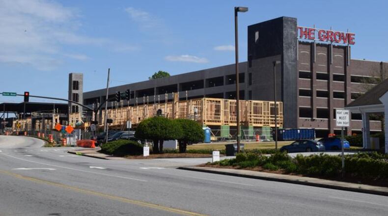 Wood frames are rising out of the ground for the last batch of luxury apartments to begin construction around the parking deck at Snellville's The Grove at Towne Center development. (Courtesy of Curt Yeomans)