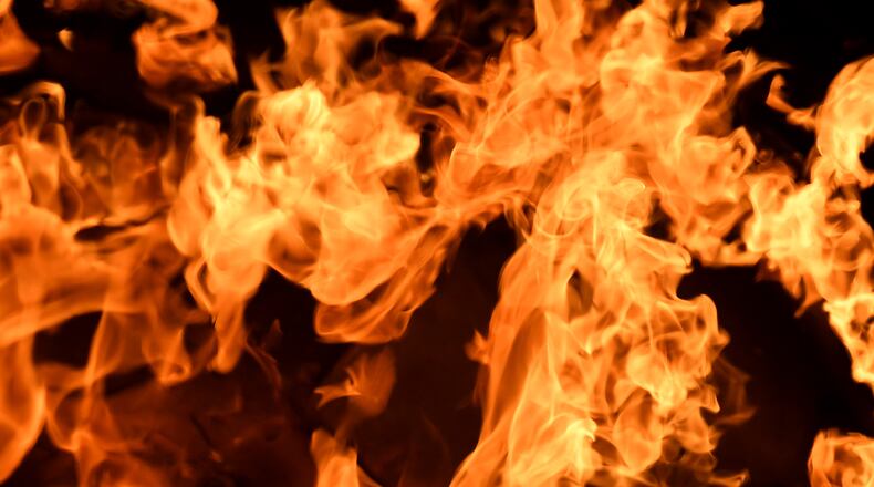 A teenager, who set a classmate's hair on fire, has returned to school.