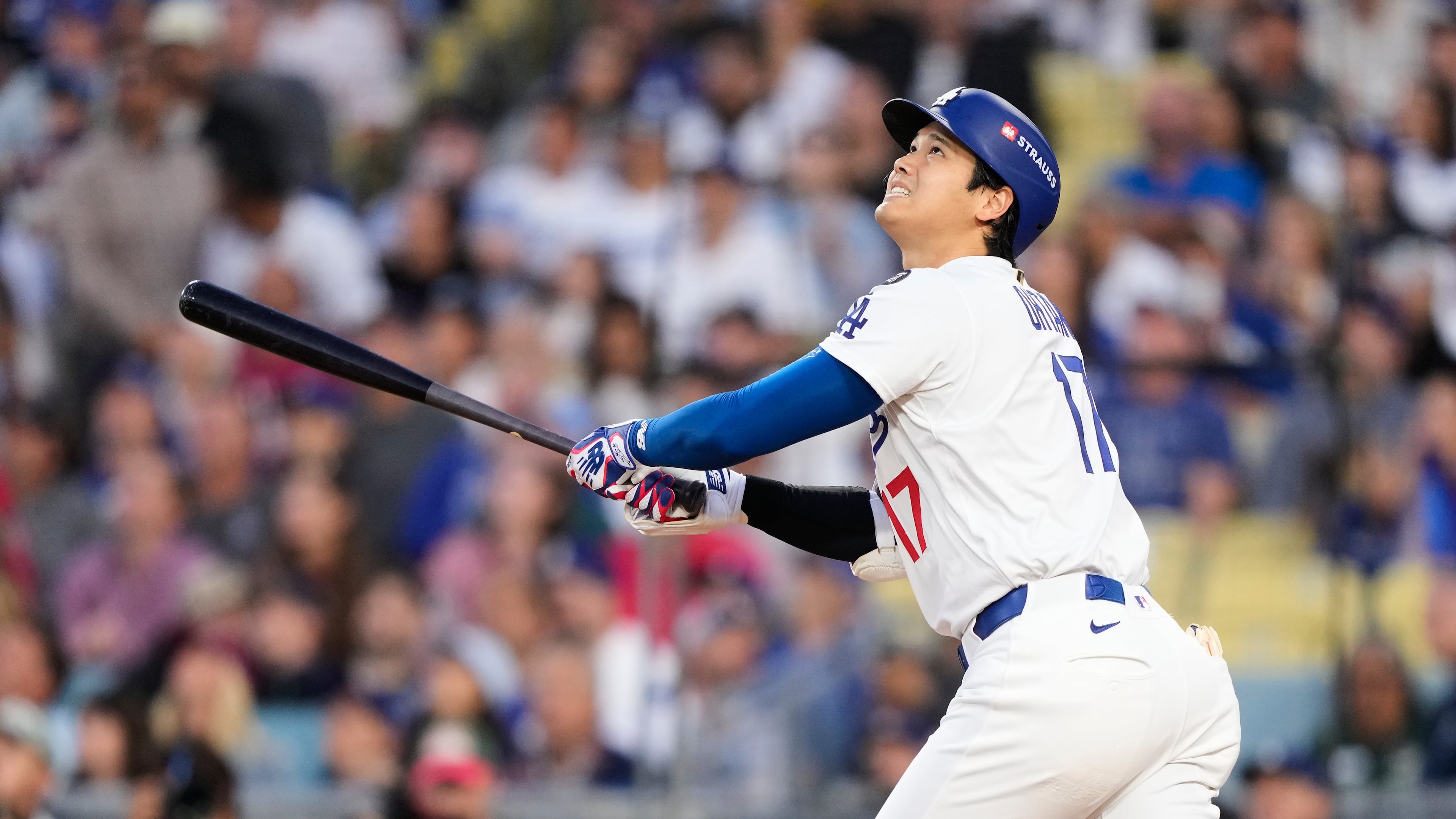 Los Angeles Dodgers' Shohei Ohtani flies out during the first inning of Game 3 of baseball's National League Division Series against the Philadelphia Phillies, Wednesday, Oct. 8, 2025, in Los Angeles. (AP Photo/Mark J. Terrill)