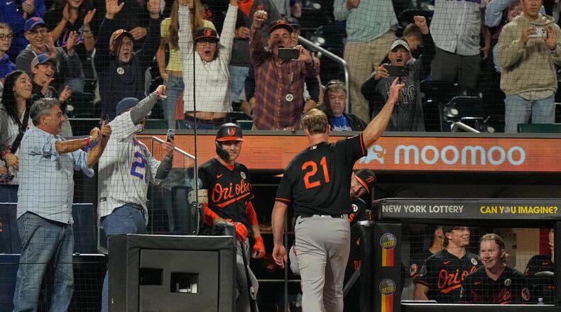 Baltimore Orioles' Pete Alonso, center, acknowledges the crowd after hitting a solo home run during the ninth inning of a baseball game against the New York Mets, Tuesday, Sept. 15, 2026, in New York. (AP Photo/Seth Wenig)