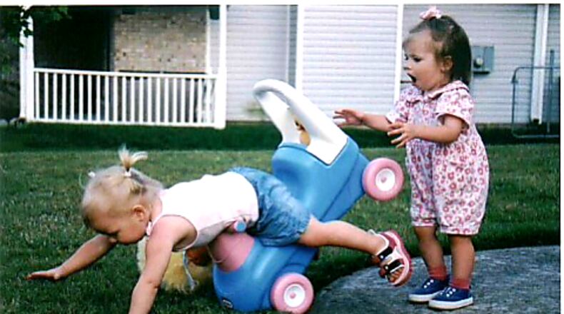 This is a picture taken of two of our granddaughters 15 years ago. The one falling became a gymnast. Can you see how she strategized her fall? The girls are Katelyn Shepard falling and Julia Newsom behind. From Bill and Kitty Shepard
