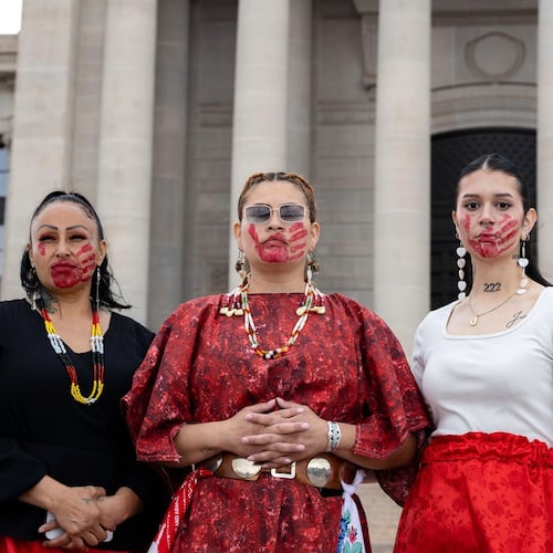 Theda Moreno, Cassandra Fraser and Tatum Escott attend an event to honor and raise awareness for Indigenous people who are missing or who have been killed, Tuesday, May 5, 2026, in Oklahoma City. (Sarah Liese/KOSU via AP)