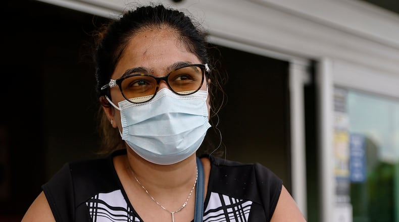 Kruti Pandya of Auburn says that she lives with in-laws in their 80′s, so she is very careful about weaing a mask. Pandya has lost a few members of her extended family to COVID. (Natrice Miller / natrice.miller@ajc.com)