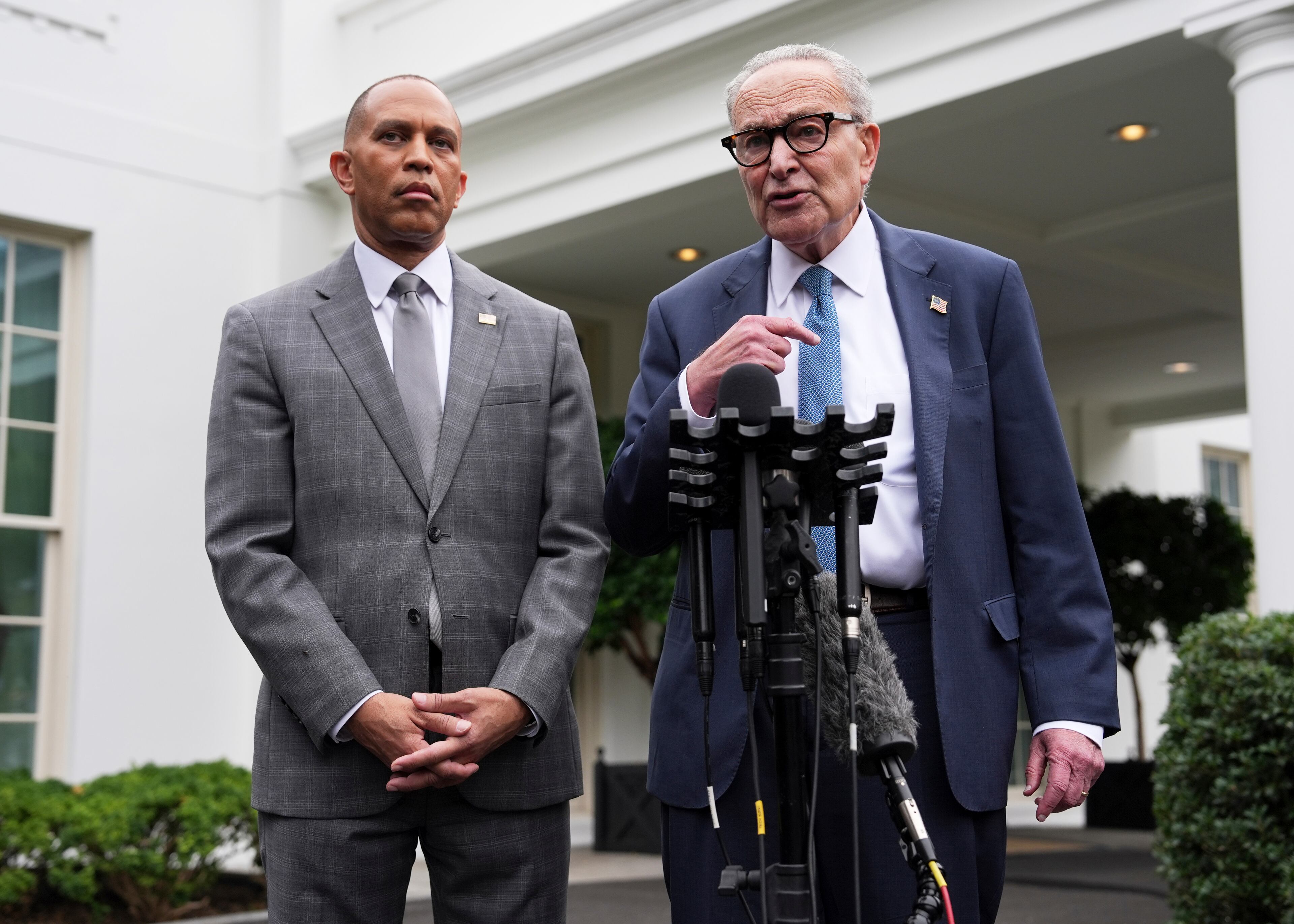 House Minority Leader Hakeem Jeffries (left) and Senate Minority Leader Chuck Schumer, both New York Democrats, spoke to the news media outside of the White House on Monday.