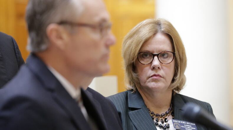 Georgia Senate Health and Human Services Chairwoman Renee Unterman, R-Buford, looks on as Lt. Gov. Casey Cagle, announced the Senate’s 2017 legislative priorities for the upcoming session at a press conference in the state Capitol. BOB ANDRES /BANDRES@AJC.COM