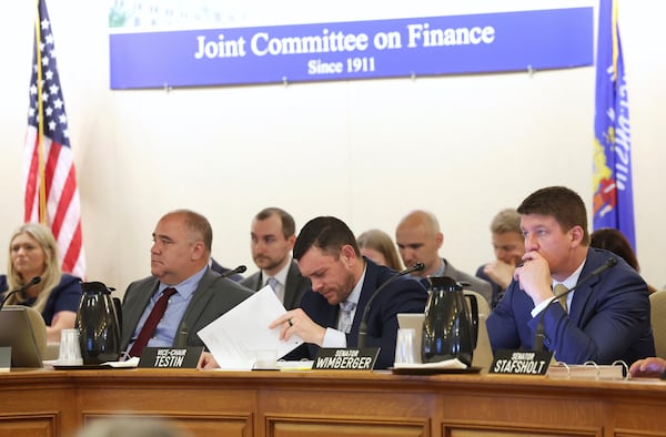 Sen. Patrick Testin, R-Stevens Point, center, and Sen. Eric Wimberger, R-Oconto, right, during a Joint Finance Committee hearing at the state Capitol in Madison, Wis. Tuesday, July 1, 2025. (Amber Arnold /Wisconsin State Journal via AP)