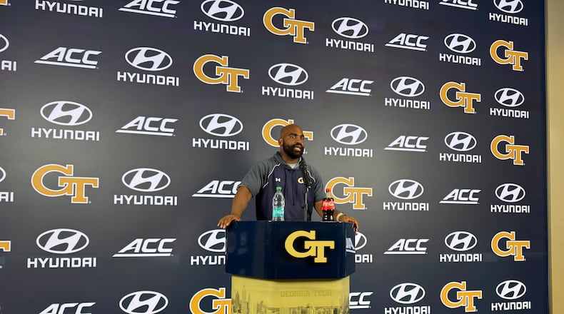 Georgia Tech defensive ends/outside linebackers coach Kyle Pope speaks during a news conference after the Yellow Jackets’ sixth practice of fall camp on Monday, Aug. 10, 2026, in Atlanta. (Fisher Isbell/AJC)