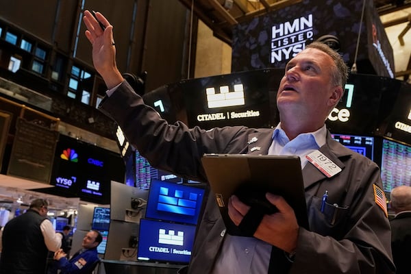 Trader Jonathan Corpina works on the floor of the New York Stock Exchange, Wednesday, May 14, 2025. (AP Photo/Richard Drew)