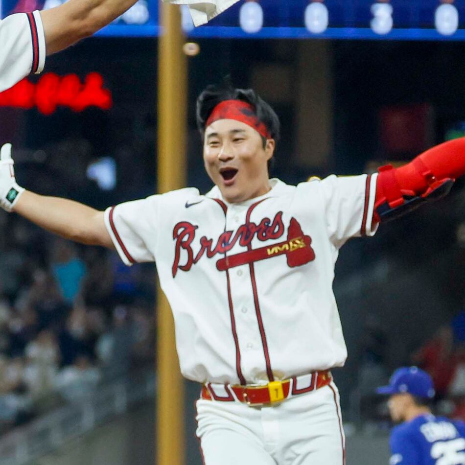 Braves shortstop Ha-Seong Kim celebrates after hitting a walk-off single in the ninth inning against the Los Angeles Dodgers on Wednesday, Aug. 26, 2026, at Truist Park in Atlanta. The Braves defeated the Dodgers, 6-5. (Miguel Martinez/AJC)