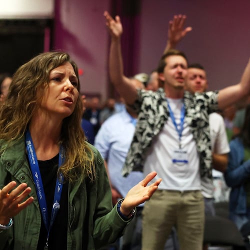 FILE - Messengers attending the Southern Baptist Convention participate in worship during the 2025 SBC Annual Meeting, June 10, 2025, in Dallas. (AP Photo/Richard W. Rodriguez, File)