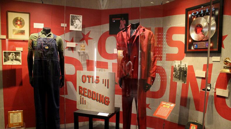 Otis Redding’s famous red suit from his 1967 tour of Europe and the overalls from a music video. At the Grammy Museum exhibit detailing Redding’s life. Photo: Melissa Ruggieri/AJC